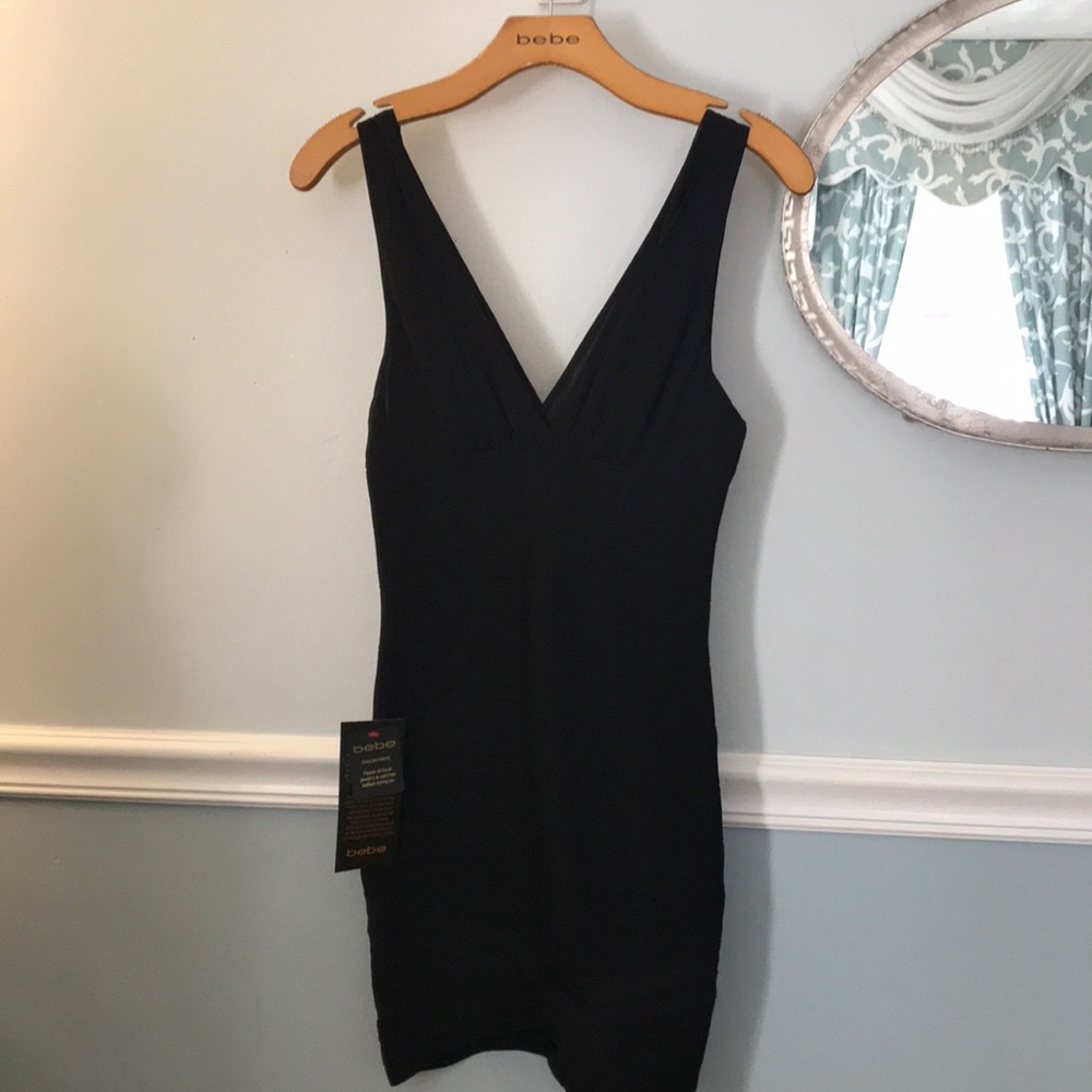 Black bodycon dress bebe never worn!!